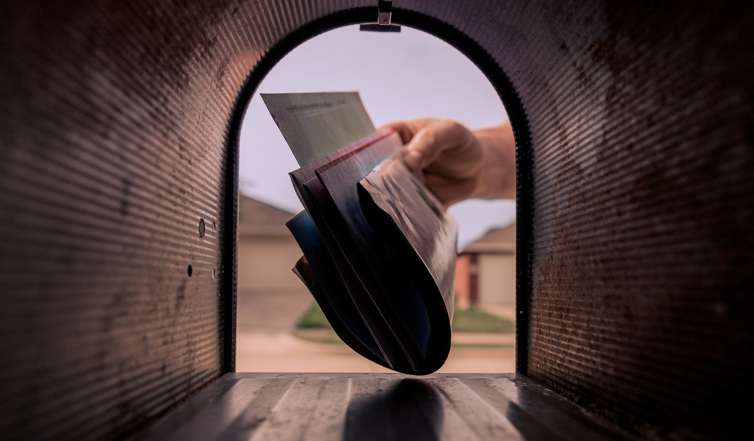 Mailman Delivering Mail